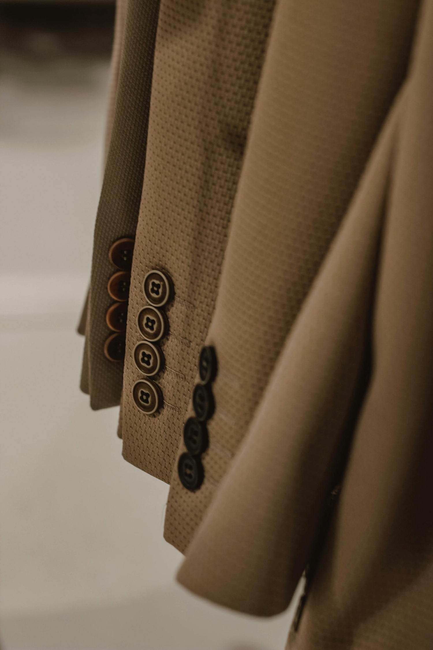 zoom sur manches avec boutons blazer